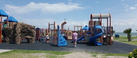 Park playground with children playing